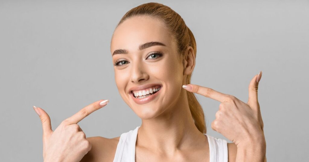 woman points to smile and asks Can I use a payment plan for braces